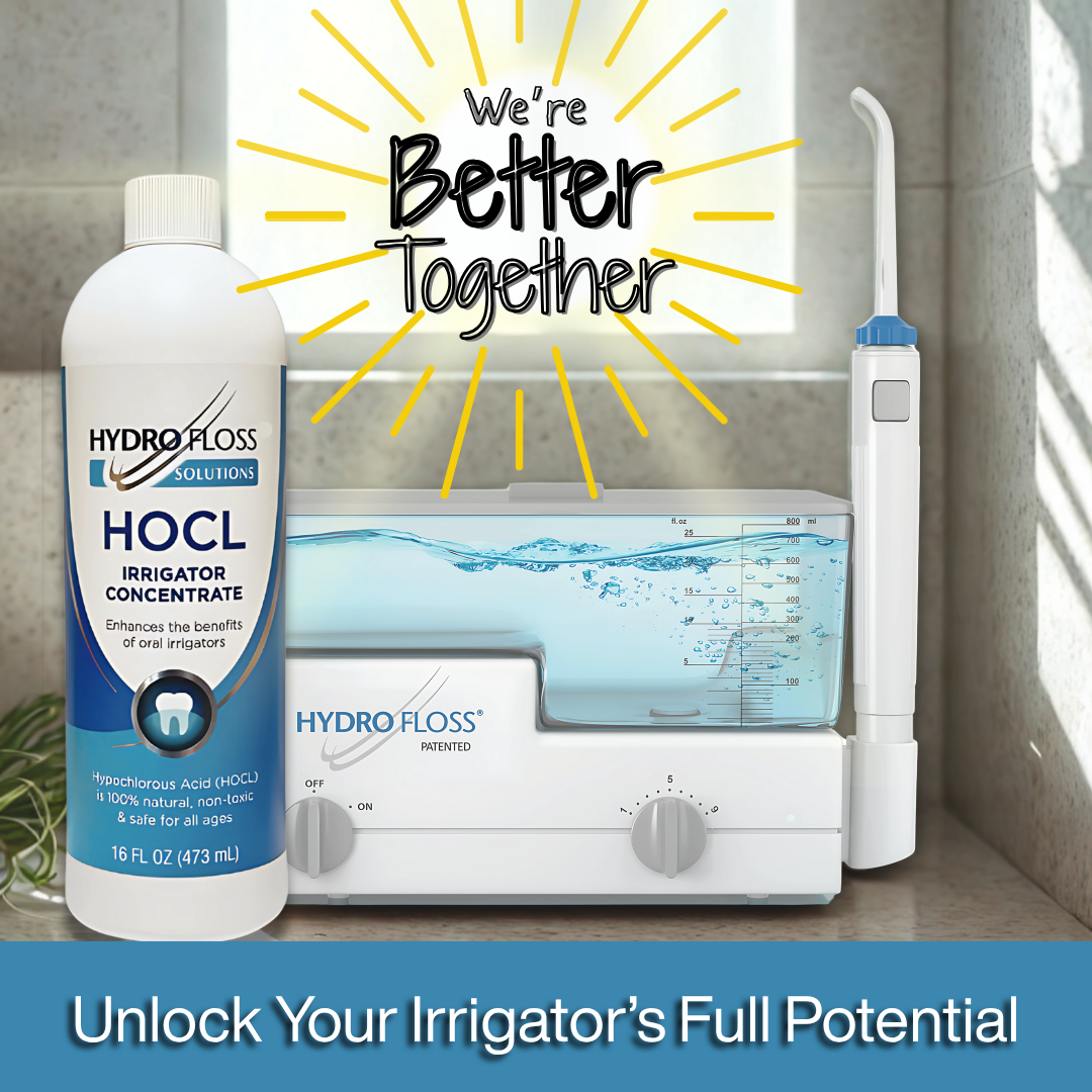 Hydro Floss Oral Irrigator and bottle of Hydro Floss Solutions HOCL Irrigator Concentrate with 'We're Better Together' text on a bathroom shelf. available at hydrofloss.com