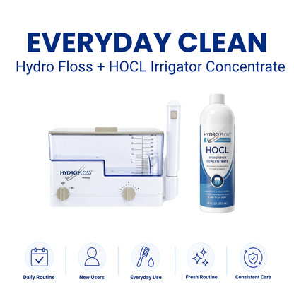 Hydro Floss dental irrigator with concentrate bottle on a white background